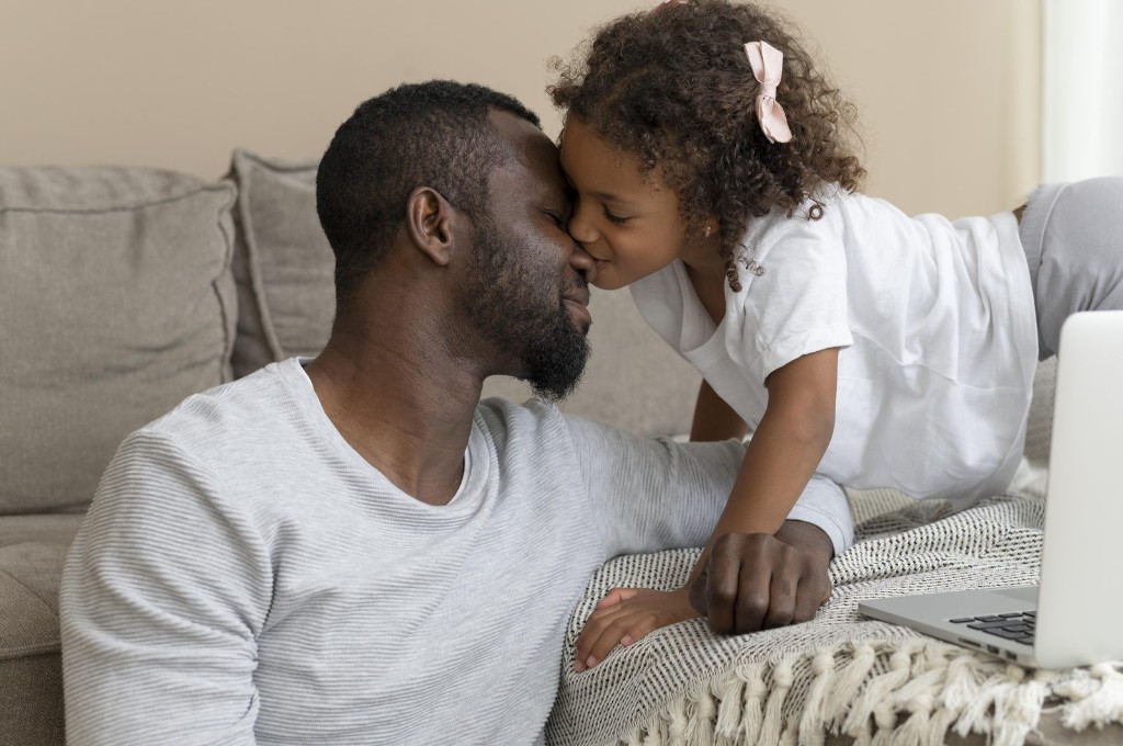A loving father sharing a joyful moment with his child